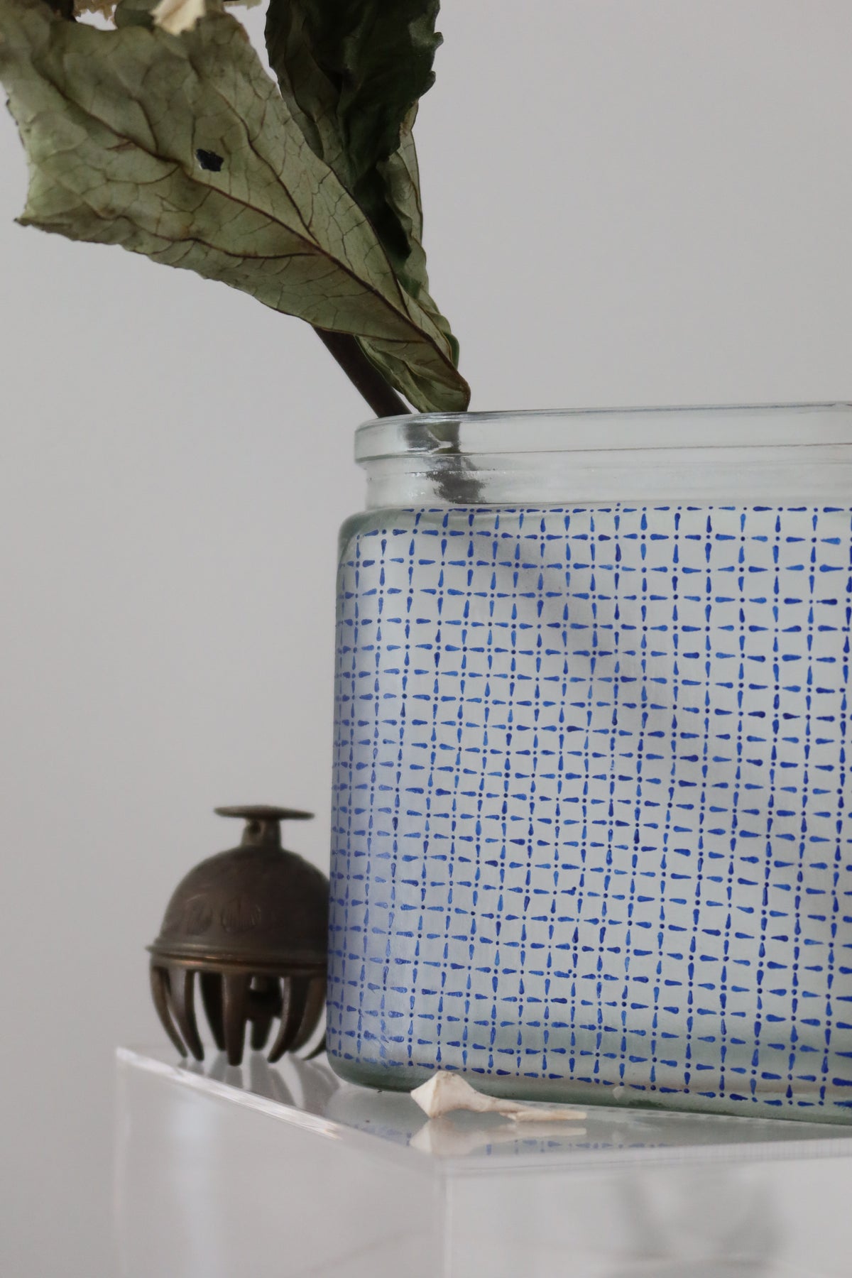 Hand painted glass container